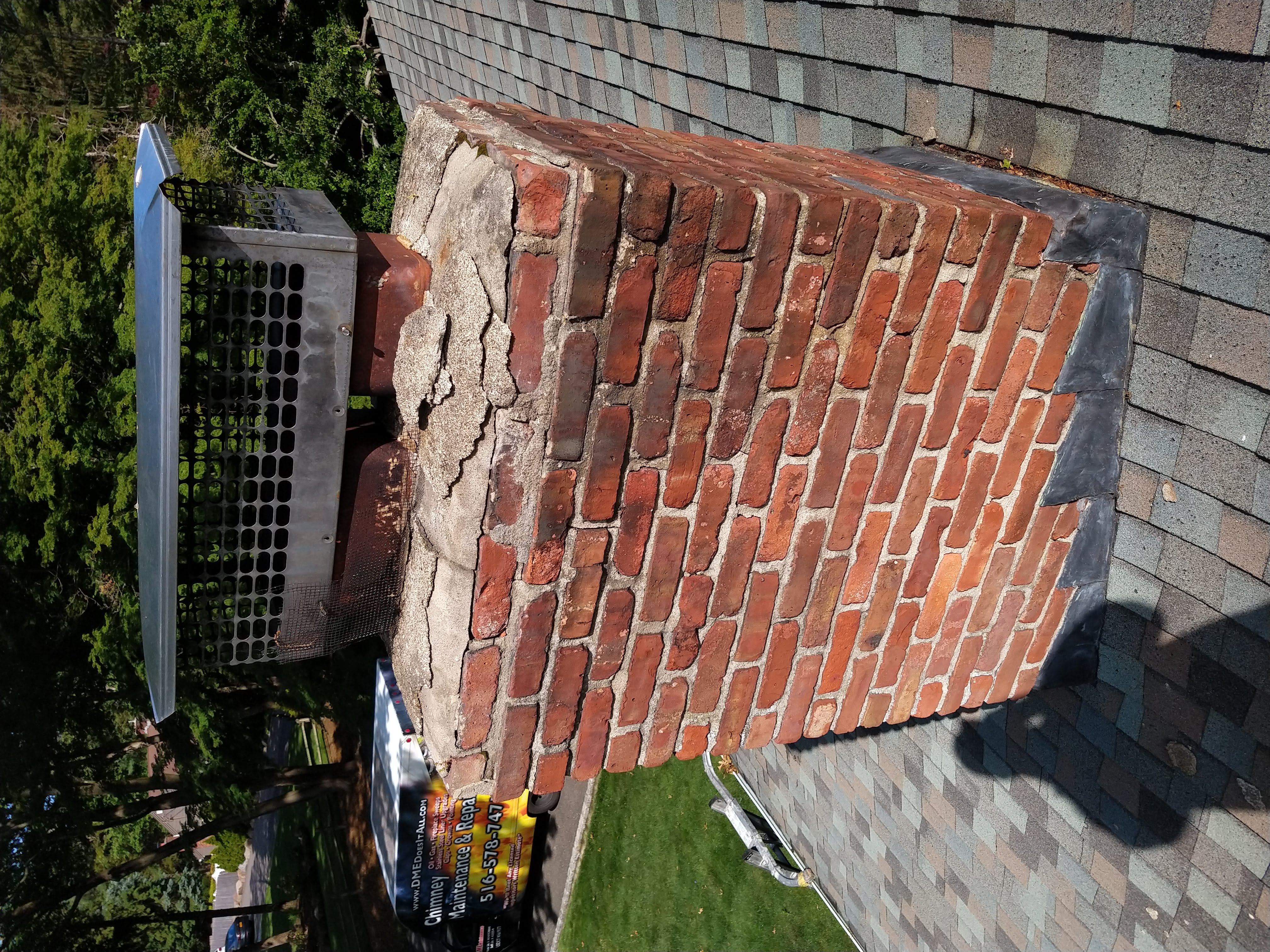Cracked chimney crown professionally repaired in Manhasset, New York